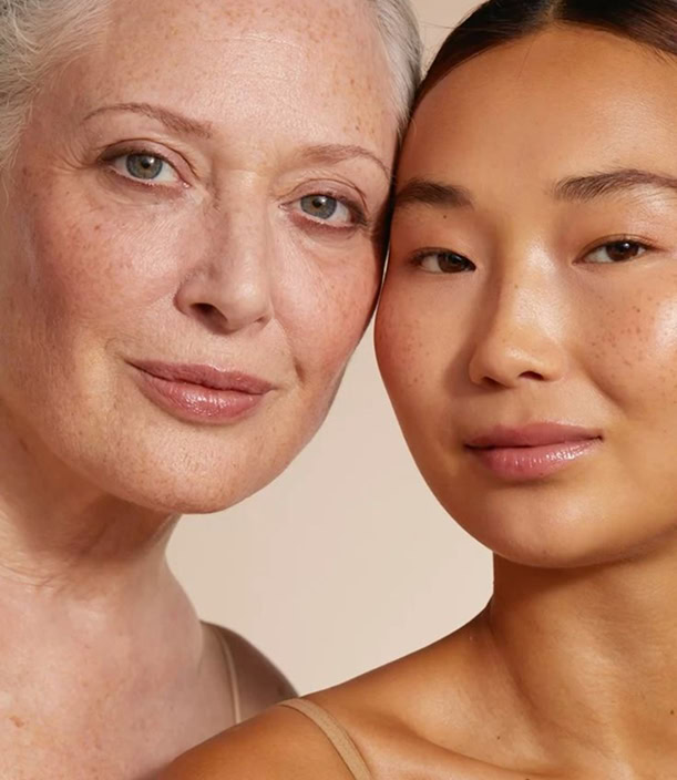 Close-up of older and younger women with glowing, natural skin Close up of older and younger women with glowing natural skin